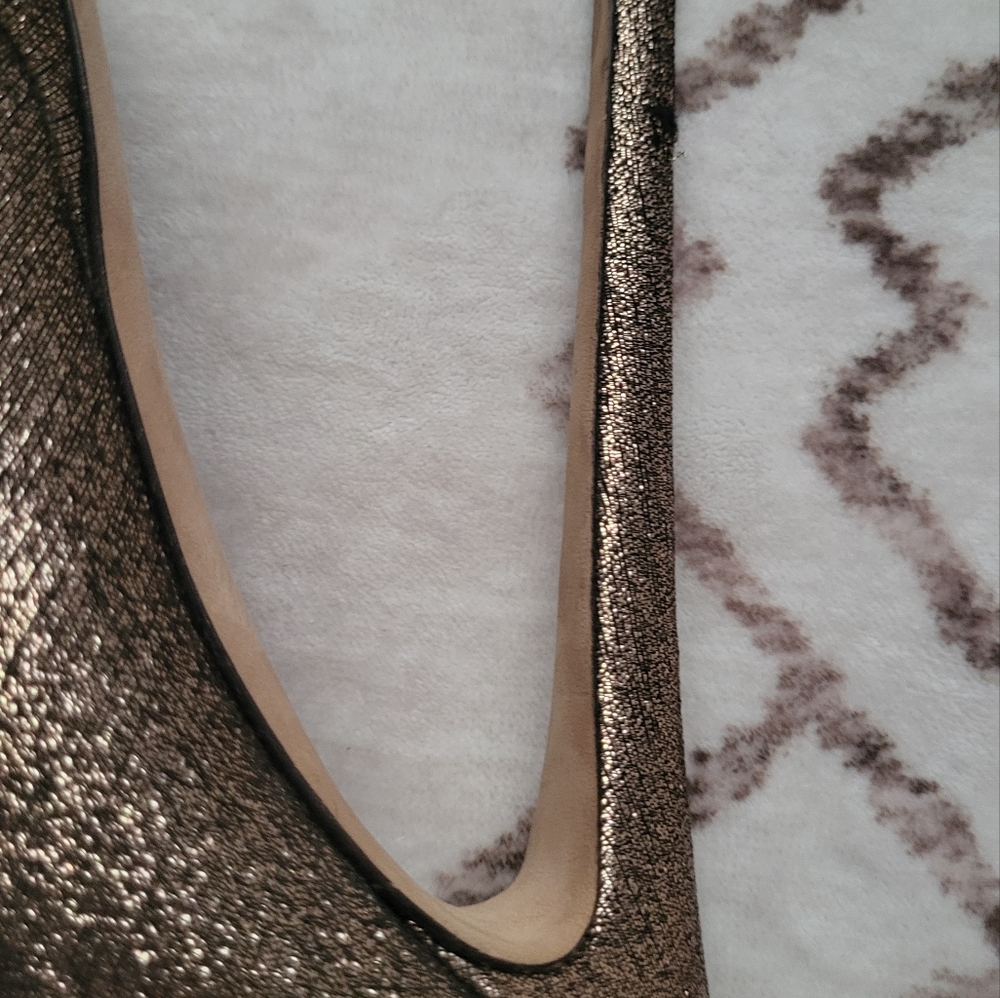 Jimmy Choo Gold Loafers with Shimmering Metallic Texture
